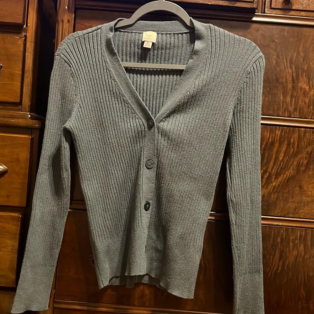 Button up ribbed v-neck sweater.